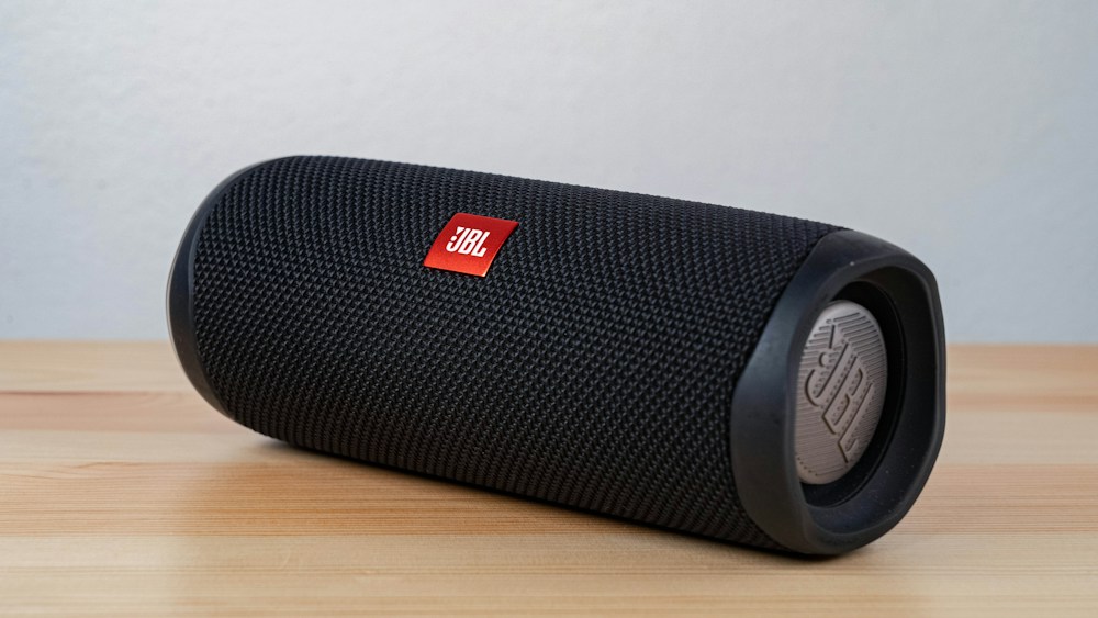 Portable audio speakers; illustrative product photograph